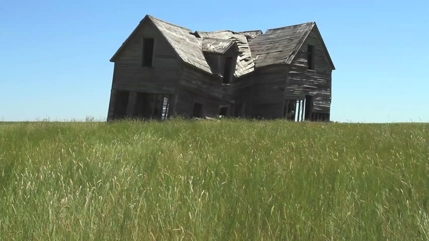 Old farm house in badly deteriorated condition