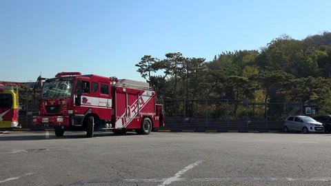 SEOUL, - OCTOBER 30, 2015:
Seoul Rescue vehicle (119) & Firetruck go on a mission.
October 30, 2015 in Seoul, South Korea