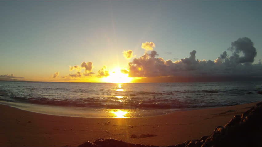 Beautiful beach ocean sunset on the island of Maui Hawaii angle one of four.