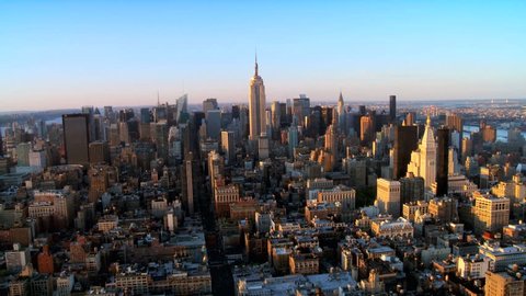 Skyline Helicopter Aerial view of Downtown Manhattan New York City at Sunset, North America USA