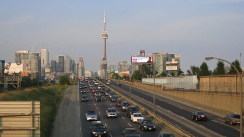TORONTO - CIRCA JULY 2011: (Timelapse View) Late afternoon Toronto skyline and  Gardiner Expressway as seen from an overpass in the Parkdale neighborhood, circa July 2011, Toronto, Canada. 