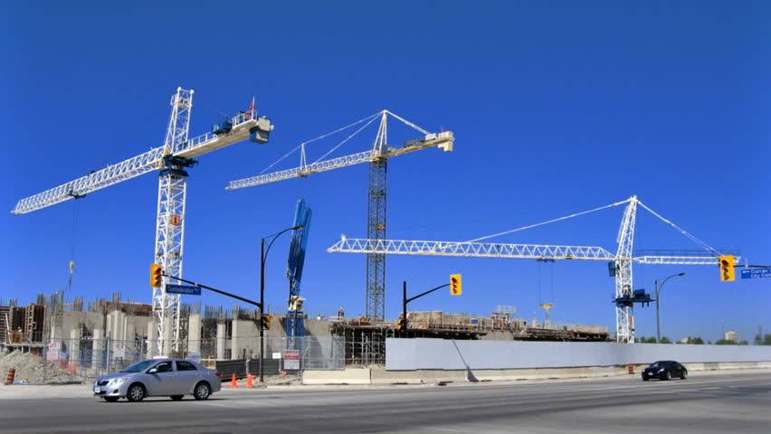MISSISSAUGA, ONTARIO - CIRCA JULY 2011: (Timelapse view) Cranes at construction