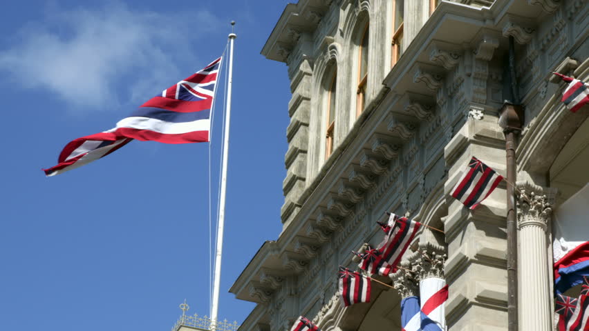 Hawaiian Flag at Iolani Palace in Downtown Honolulu, Oahu, Hawaii, the only royal palace in the United States.