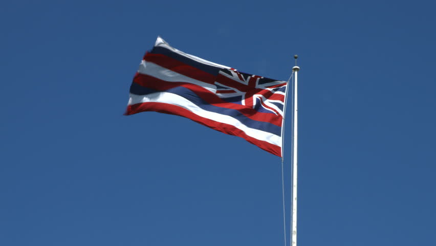 Hawaiian Flag at Iolani Palace in Downtown Honolulu, Oahu, Hawaii, the only royal palace in the United States.