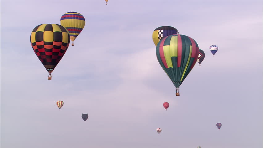 Balloons fly above, point of view shot from the ground - Albuquerque, NM - USA, Oct, 2007