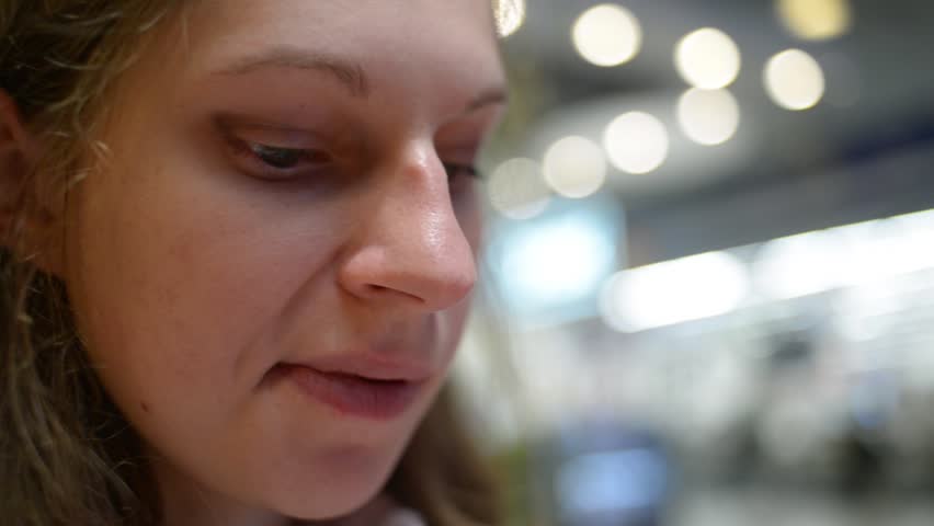 KHERSON, UKRAINE - NOVEMBER 16, 2015: Girl Eating a fast food - potato