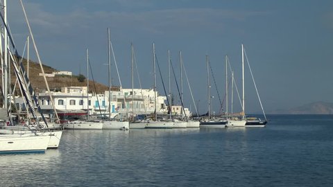Yachts at the waterfront of a small Greek town, Amorgos island, Greece.

