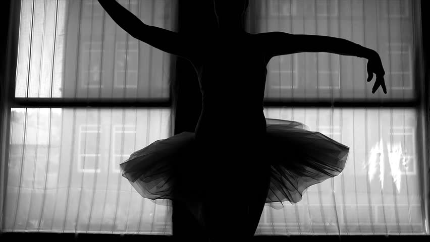 dancer in front of a window