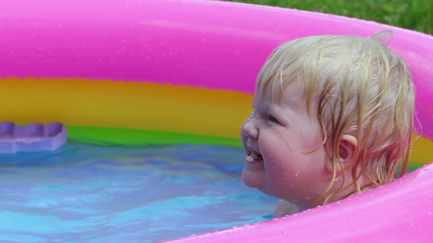 baby-girl bathes in a pool - 3 shots