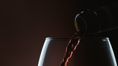 Cinemagraph - Wine pouring in slow motion. Looping Motion Photo. 