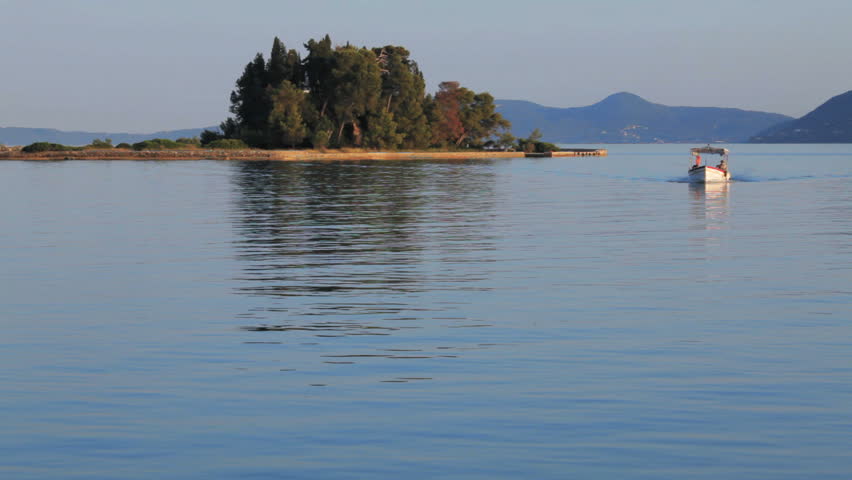 Tourist boat, sailing from Pontikonisi island, Kanoni, Corfu, Greece