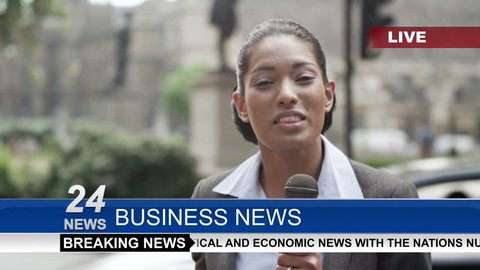 4K Female news reporter doing live piece to camera outdoors in the city of London. Shot on RED Epic.