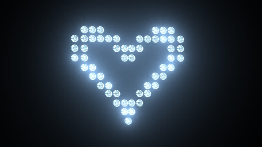 Rotating heart made of light bulbs, Full HD. Seamless looping Valentines day background