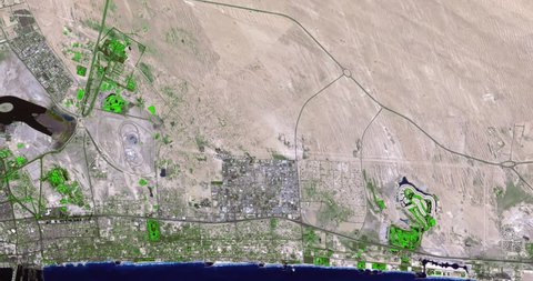 Aerial time lapse shows increase in vegetation and irrigation in Dubai, 2002-2011. 3 second head pad, 12 second time lapse, 3 second tail pad. Alternate view.