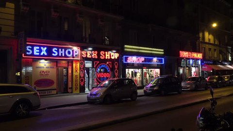 PARIS, FRANCE - AUTUMN, 2015: Sex shop in Paris. Night. France. Shot in 4K (ultra-high definition (UHD)).
