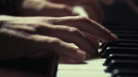 A very close look at a jazz pianist's hands.