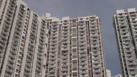 Blocks of flats in dense populated area of Kowloon. 4K resolution speed up. Hong Kong, October 2015. Flat profile without color correction. Visit my portfolio for color graded version. 