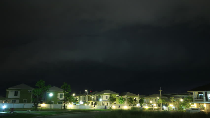 Thunderstorm lightning and rain storm clouds running at neighborhood Time Lapse  ,UHD 4k 3840x2160.
