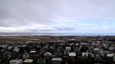 reykjavik in iceland city high point ariel view with streets and houses looking out onto sea