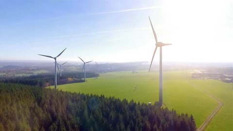 Windmill / Wind power technology - Aerial drone Birds eye view on Wind Power also know as wind turbine, Windmill, Energy Production - Clean and Renewable Energy