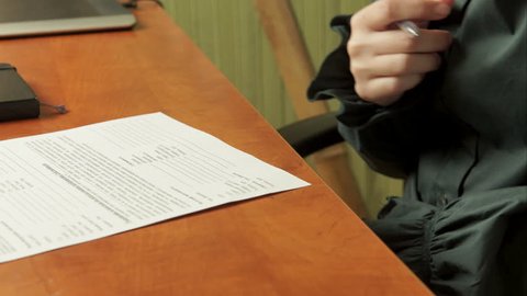 Woman signs a contract. Signature.  4k Video 3840x2160