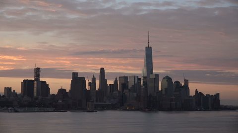 View of Downtown Manhattan and Freedom Tower across Hudson River  at dawn