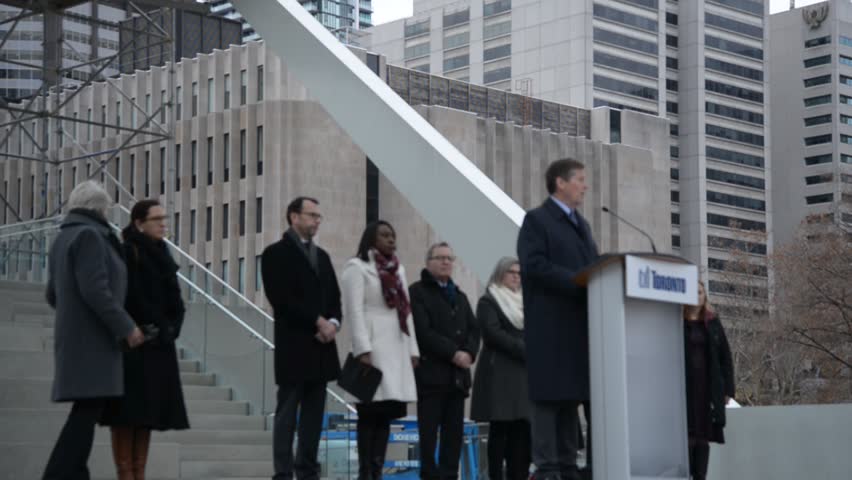 TORONTO, CANADA - 14th November Saturday 2015: Hundreds of people paid tribute to victims of deadly attacks in Paris during a vigil at Nathan Phillips square in Toronto,Canada on November 14, 2015 | Shutterstock HD Video #12918944