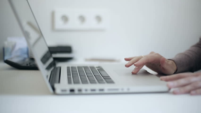 Woman working at laptop finished her work closed laptop