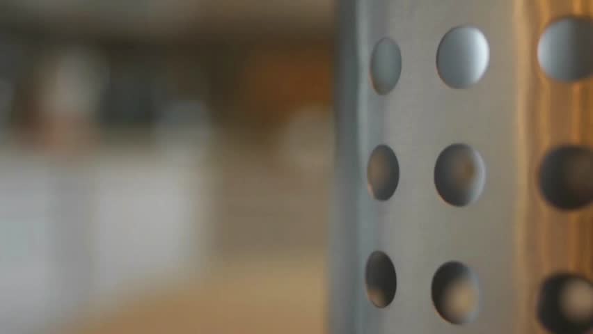 Looped movement: steel circle with holes.