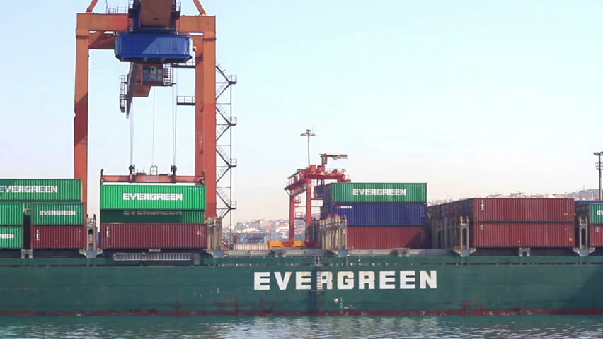 ISTANBUL - MAY 16: Evergreen Container Ship shot while gantry lifts up a