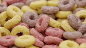 Closeup shot of rotating healthy multicolored cereal. Another shots available in my profile.