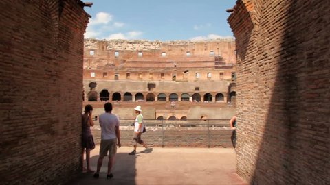 Camera move inside Colosseum and show arena, start from between two walls