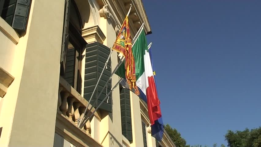 Three flags in Dolo, Italy