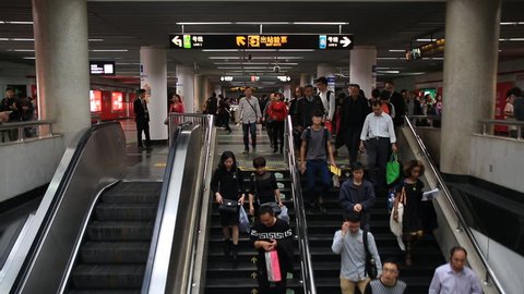 SHANGHAI, CHINA - 07 Nov. 2015 : Time lapse of crowds of people in the subway station in Shanghai, China. 