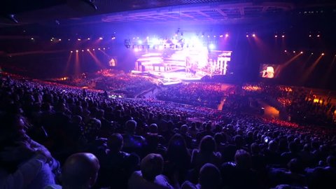 MOSCOW, RUSSIA - NOVEMBER 14, 2015: Huge concert hall with lots of spectators. Concert of russian chanson "Eh Razguliay" (Eh, Partying!) inside Olympic concert hall.