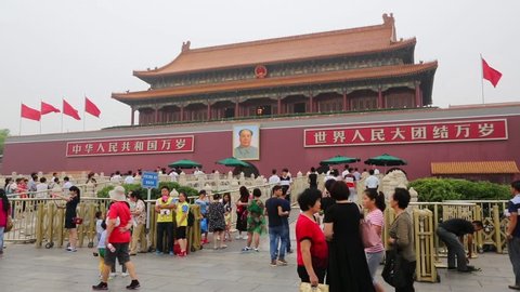 BEIJING - CIRCA JUNE , 2015: People go to the Gate of Heavenly Peace - the main entrance to the Forbidden City. Located in the historic centre of Beijing, just north of the main square of Tiananmen.