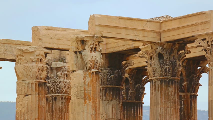 Centuries old temple remains, marble columns with ornamented capitals on top