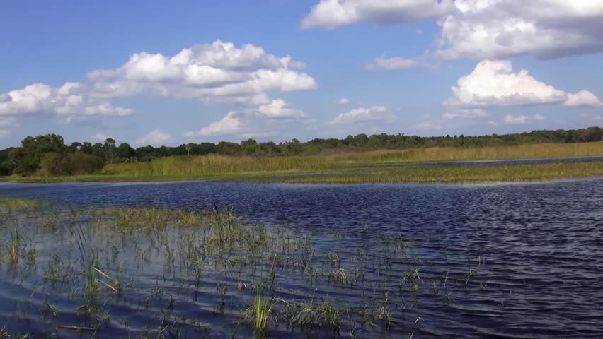 Riding on a beautiful lake on a sunny day