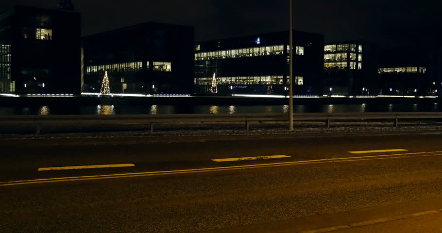Night street view with few cars in Copenhagen, Denmark
