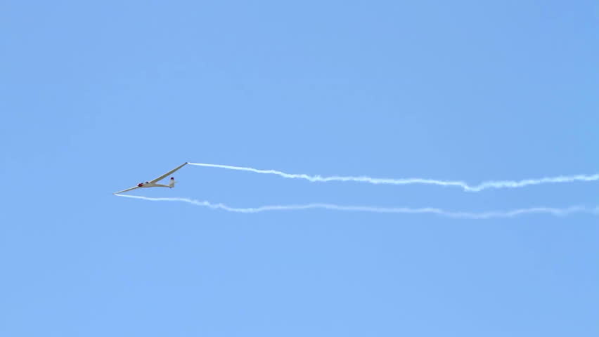 Sailplane performing elegant aerobatics