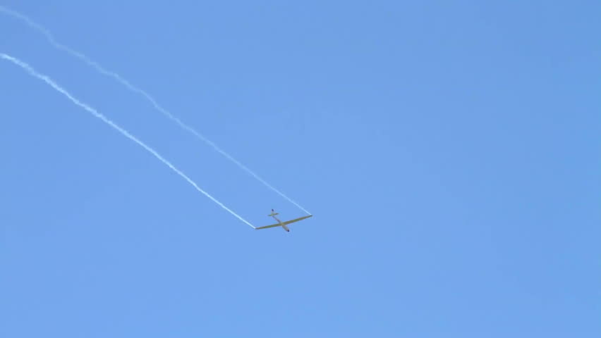 Sailplane performing elegant aerobatics