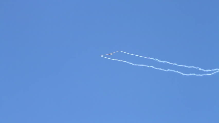 Sailplane performing elegant aerobatics