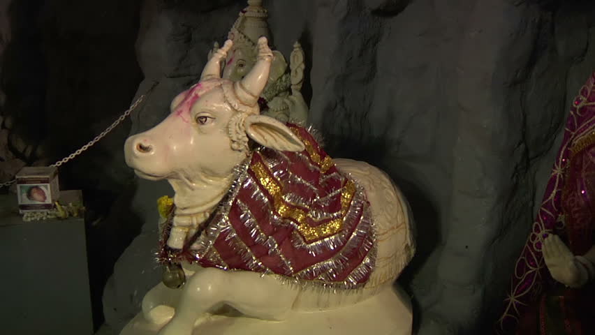 Ceramic Statues of Hindu God Nandi and Goddess Parvathi in Shiva Temple. Bangalore, India