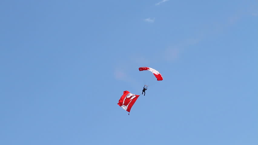 Canadian air force skydiver with Flag