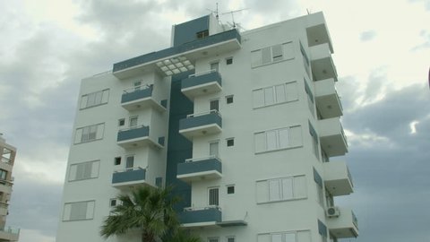 Empty high-rise dwelling house in resort city. Crisis on real estate rent market