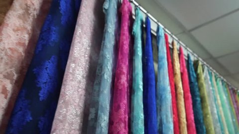 Dolly shots of beautiful lace lined showroom, colorful