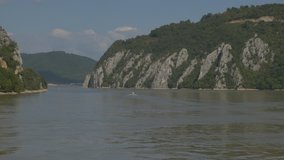 World famous Kazan gorge entrance on river Danube 4K 2160p UHD footage - National park Djerdap on Danube river symbol by the day from Romanian side 4K 3840X2160 UHD video