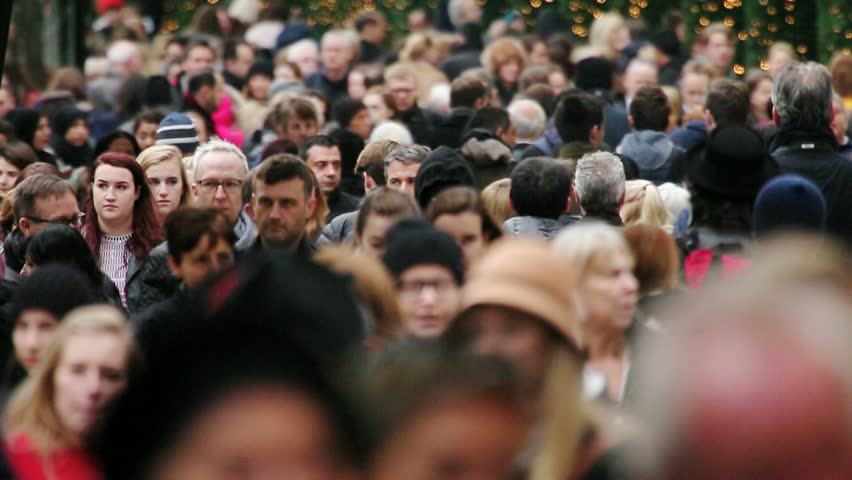 London, Nov 2015: After years of economic downturn, retail areas like Oxford street are once again packed with thousands of people out spending money in the capital's shops. Every age & race are here. | Shutterstock HD Video #13021244