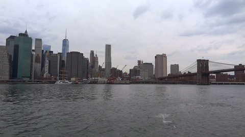 View at Manhattan and Brooklyn Bridge from East River. New York USA