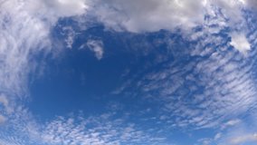 Rolling clouds in the blue sky, timelapse 4K video